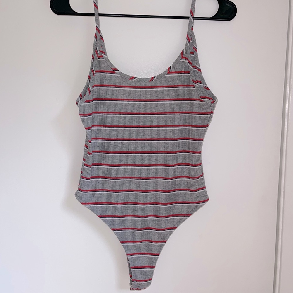 Lucy Love gray striped with red, white and black bodysuit